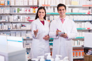 two pharmacists smiling